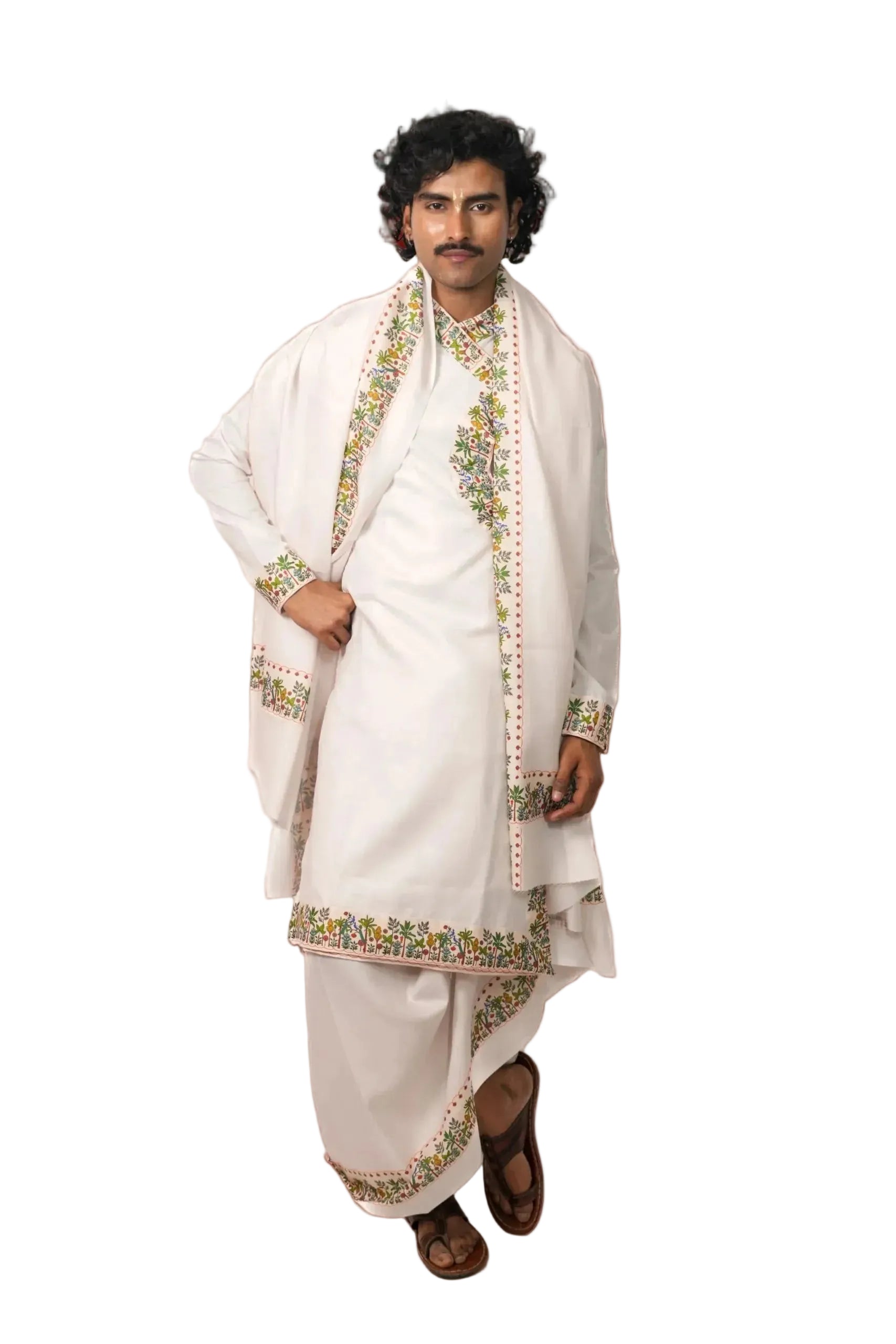Man wearing a traditional white embroidered outfit on a white background